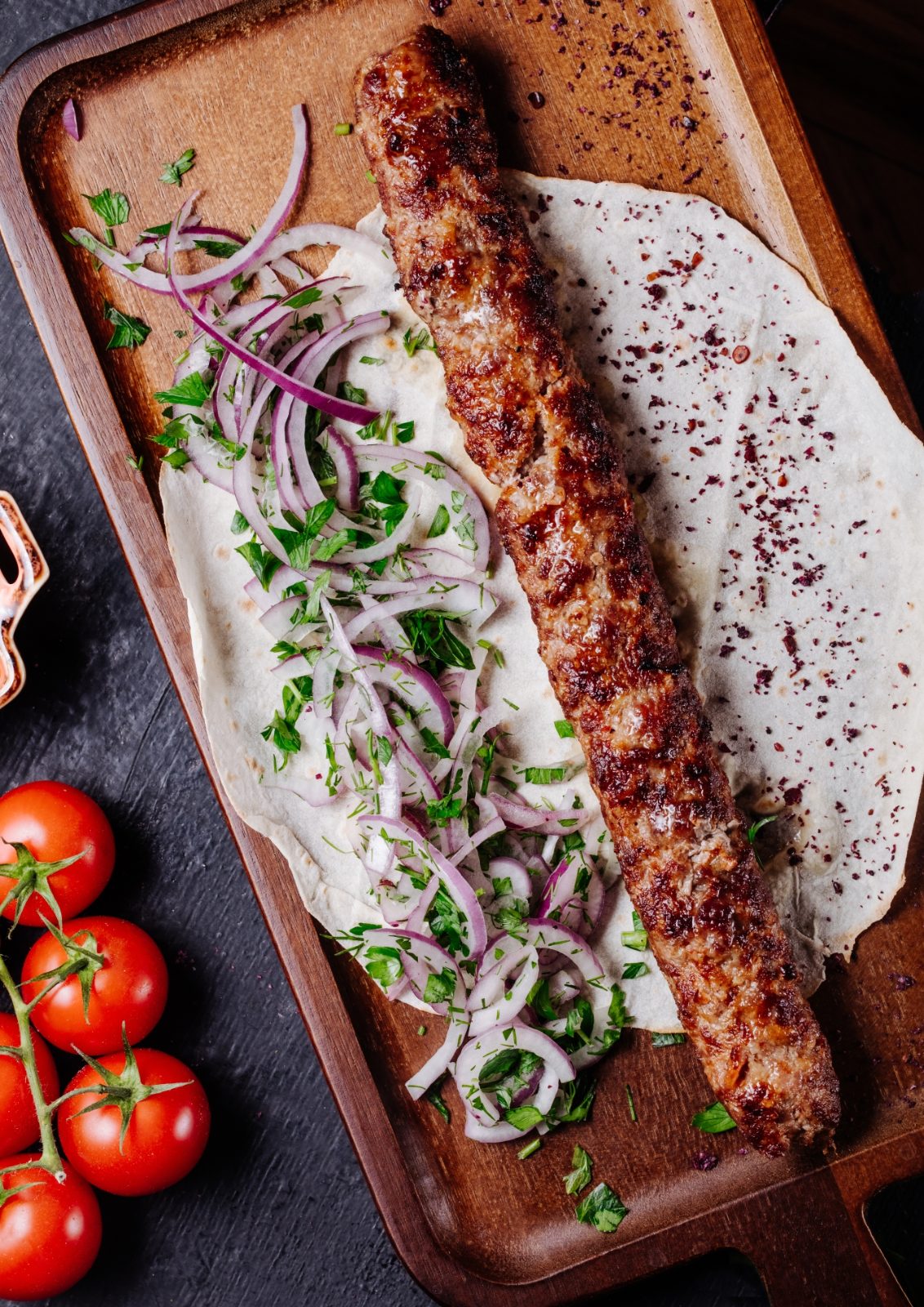 Charcoal-grilled lule kebab on lavash